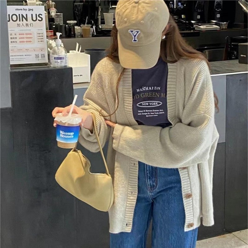 Damer Oversized Stickad jacka med mjuka ärmar och knäppning Mirla-Eva Jonsson