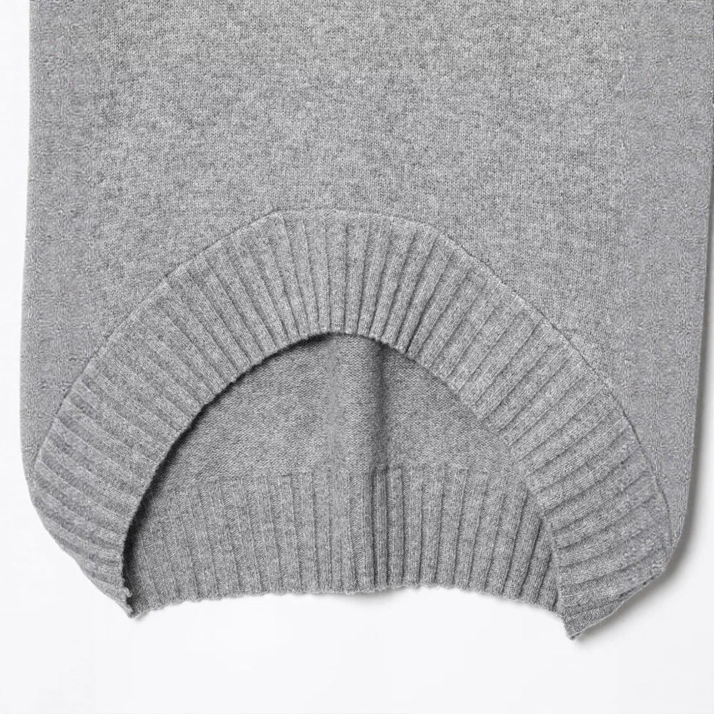 Damer Oversized Stickad tröja med asymmetrisk cut Mirla-Eva Jonsson