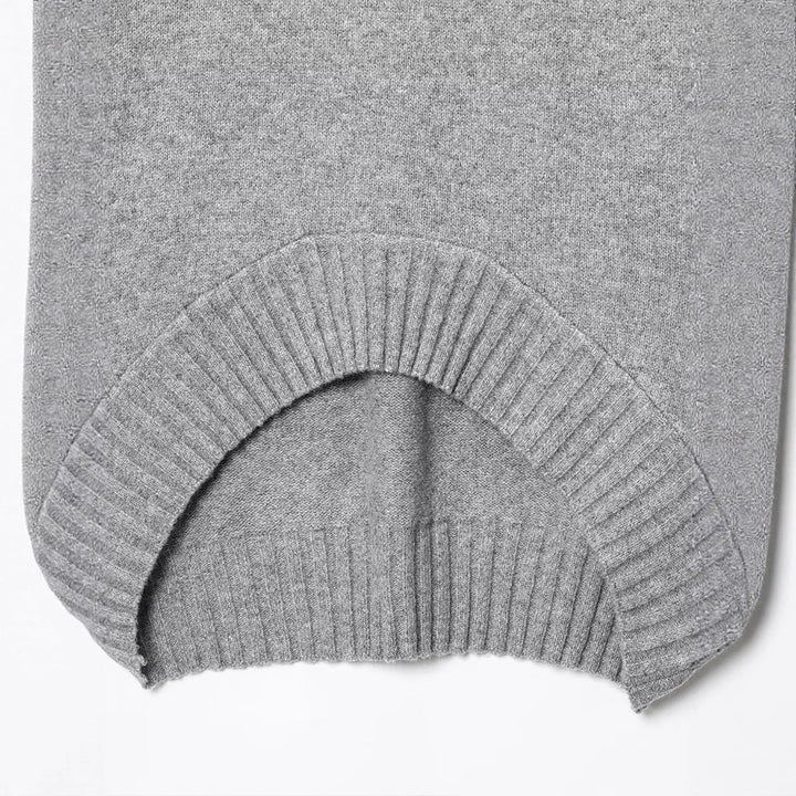 Damer Oversized Stickad tröja med asymmetrisk cut Mirla-Eva Jonsson