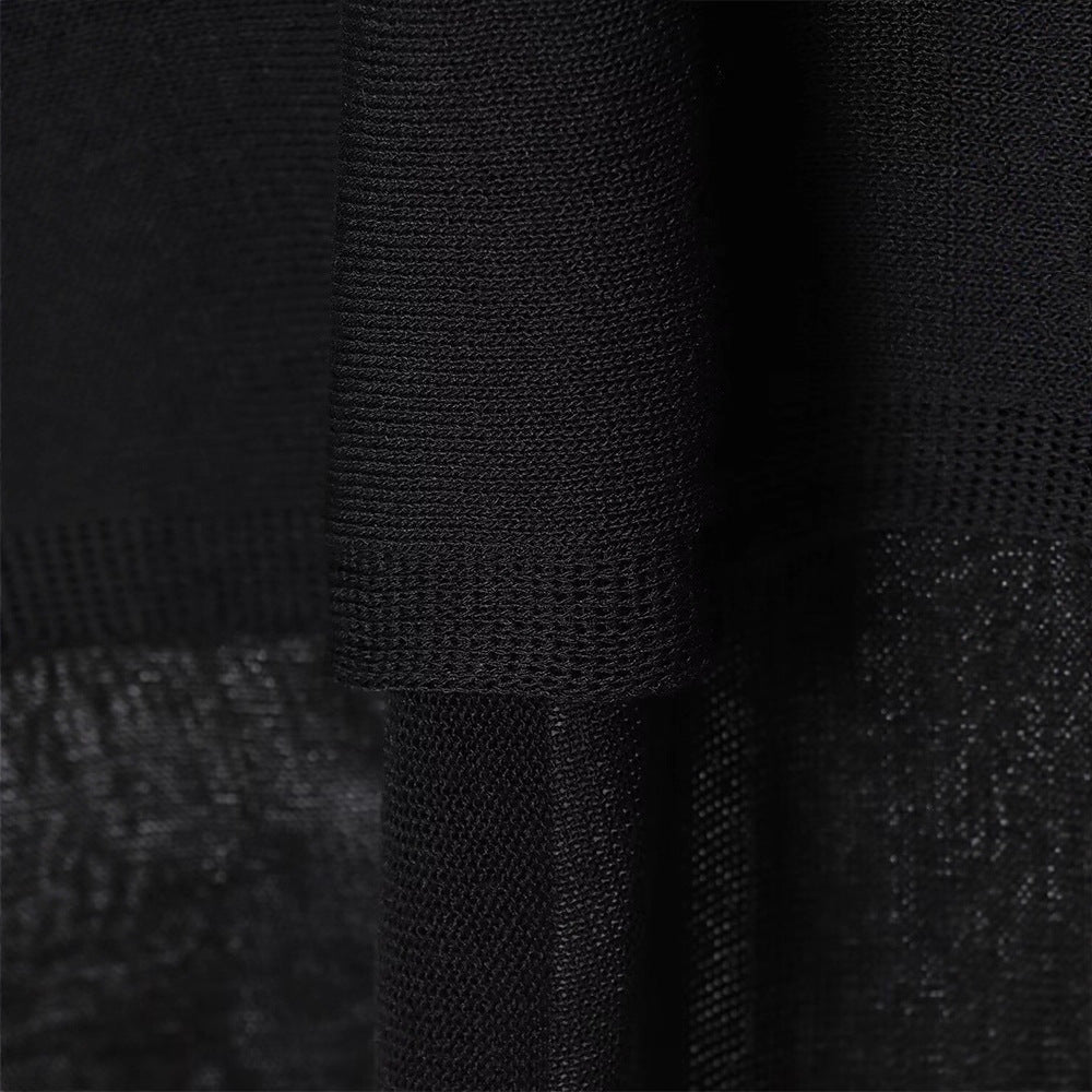 Damer Oversized Stickad tröja med asymmetrisk kant Mirla-Eva Jonsson