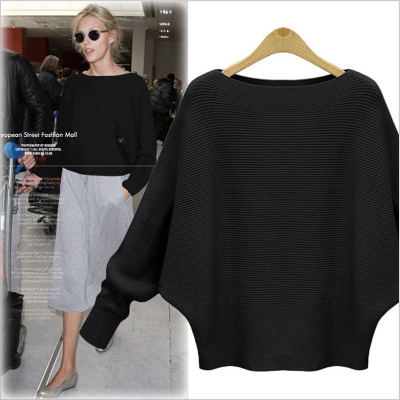 Damer Oversized Stickad tröja med off-shoulder design och avslappnad passform Eva Jonsson-Eva Jonsson