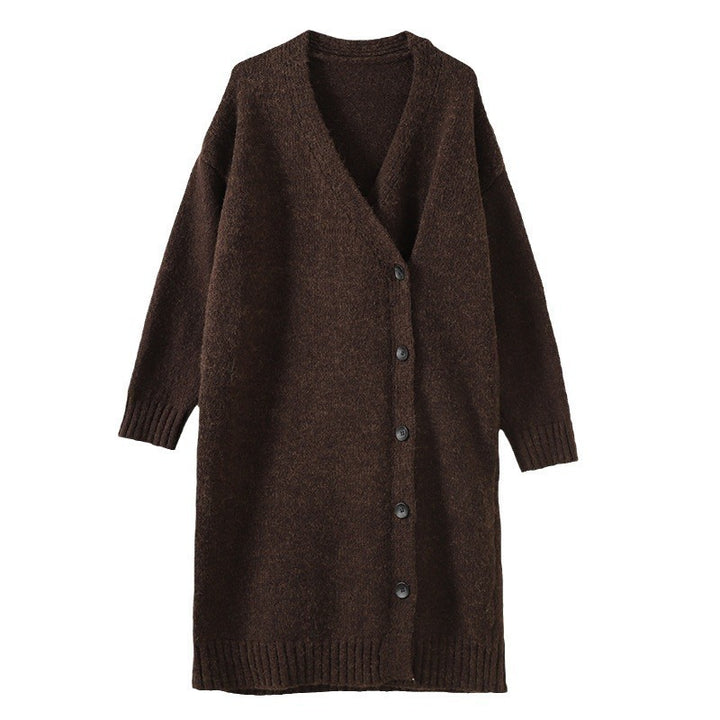 Damer Oversized Stickjacka med Trendiga Knappdetaljer och Sidelommer Mirla-Eva Jonsson