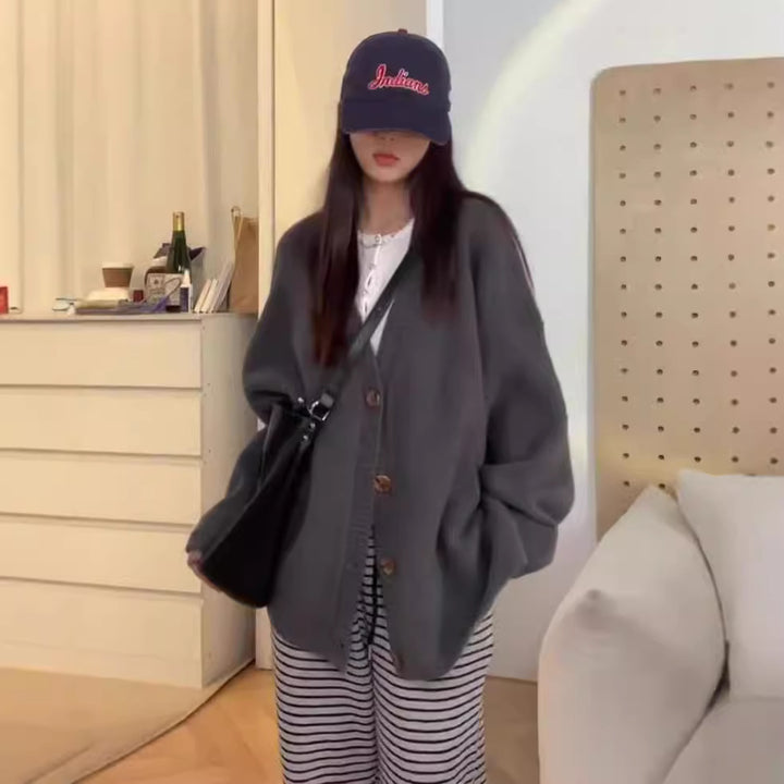 Damer Oversized Stickjacka med breda ärmar och knappdetaljer Mirla-Eva Jonsson