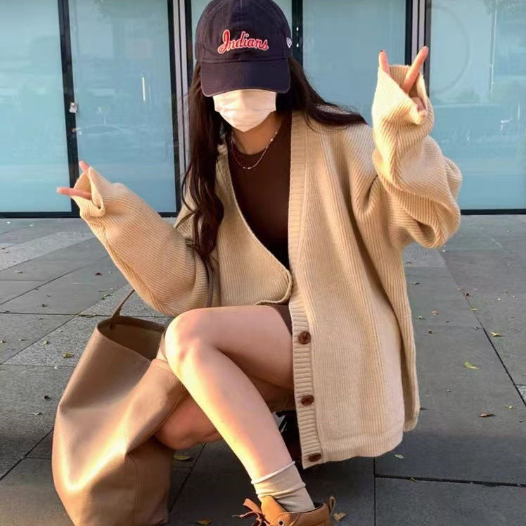 Damer Oversized Stickjacka med breda ärmar och knappdetaljer Mirla-Eva Jonsson