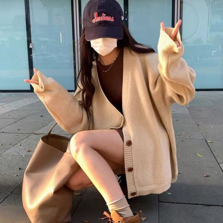 Damer Oversized Stickjacka med breda ärmar och knappdetaljer Mirla-Eva Jonsson