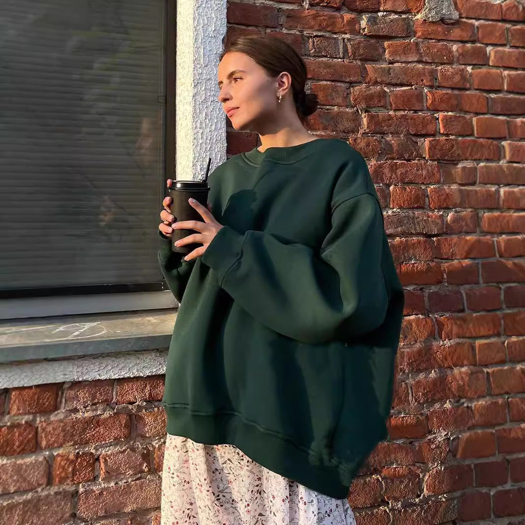 Damer Oversized Sweatshirt i avslappnad stil med överdimensionerade ärmar och elastiska manschetter Mirla-Eva Jonsson