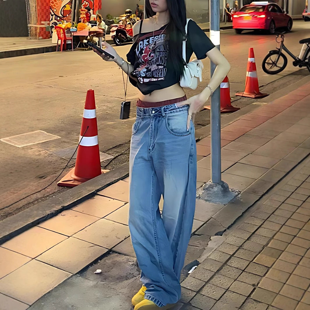 Damer Oversized T-shirt med kreativt grafiskt tryck och avslappnad passform Mirla-Eva Jonsson