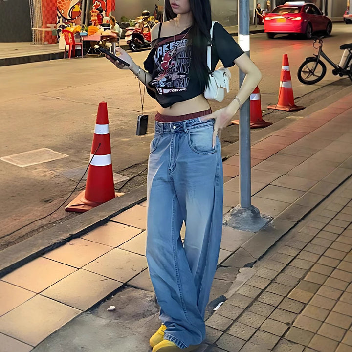 Damer Oversized T-shirt med kreativt grafiskt tryck och avslappnad passform Mirla-Eva Jonsson
