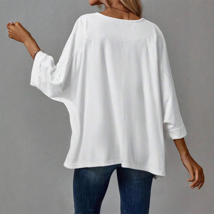 Damer Oversized Topp med avslappnad passform och raglanärmar Mirla-Eva Jonsson