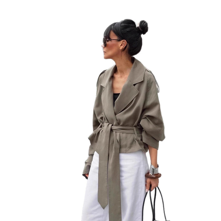 Damer Oversized Trenchcoat med figursydd bälte och voluminösa ärmar Mirla-Eva Jonsson