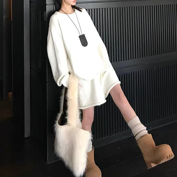 Damer Oversized Tröja med asymmetrisk skärning och moderiktig krage Mirla-Eva Jonsson