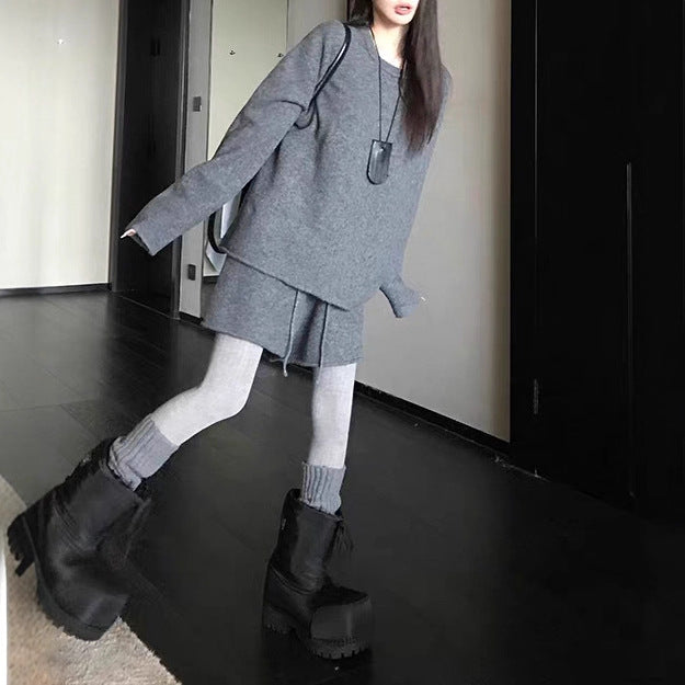 Damer Oversized Tröja med asymmetrisk skärning och moderiktig krage Mirla-Eva Jonsson