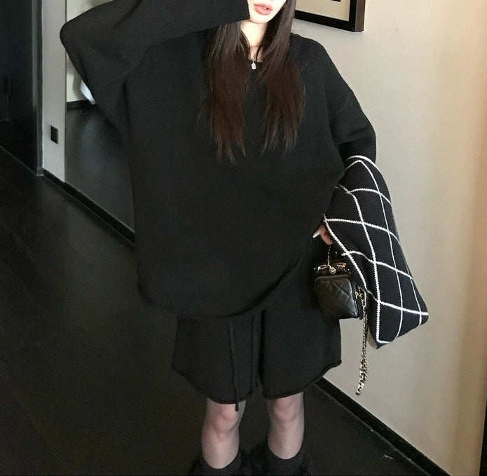 Damer Oversized Tröja med asymmetrisk skärning och moderiktig krage Mirla-Eva Jonsson