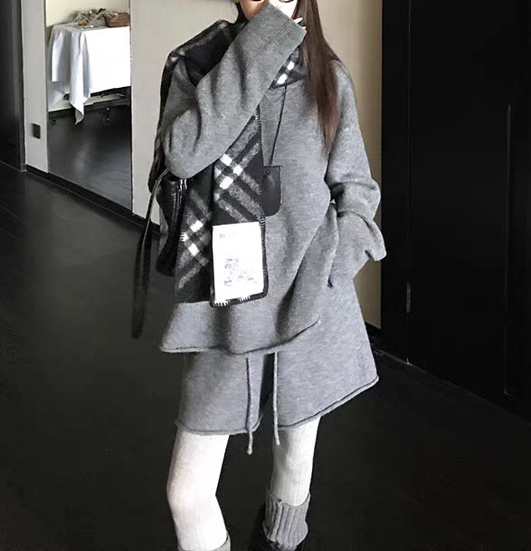 Damer Oversized Tröja med asymmetrisk skärning och moderiktig krage Mirla-Eva Jonsson