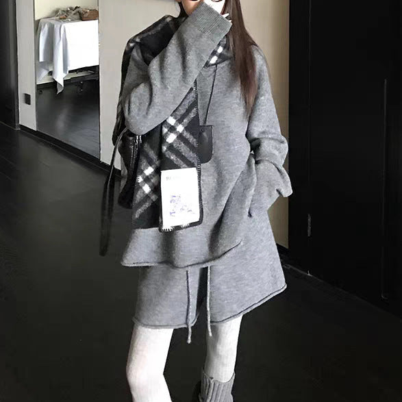Damer Oversized Tröja med asymmetrisk skärning och moderiktig krage Mirla-Eva Jonsson