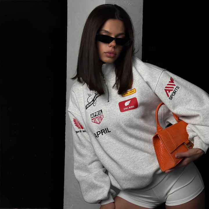 Damer Oversized Tröja med stiliga grafikdetaljer Mirla-Eva Jonsson