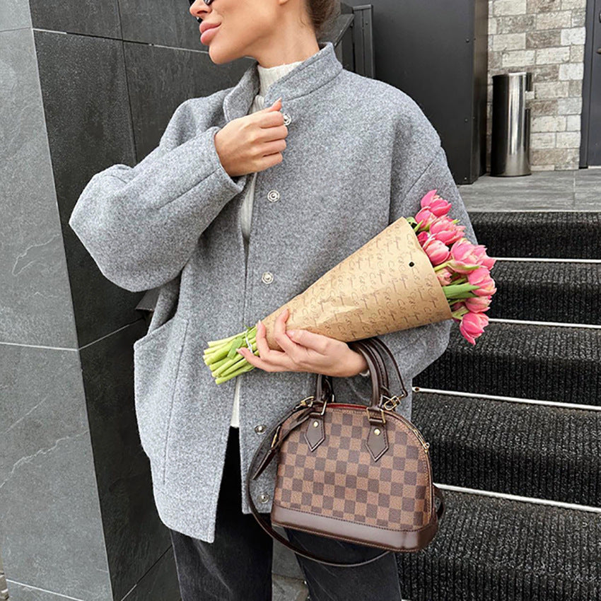 Damer Oversized Ulljacka med dold knäppning och praktiska fickor Mirla-Eva Jonsson