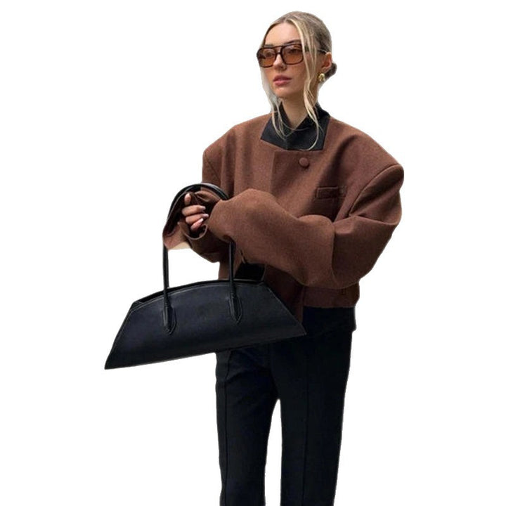 Damer Oversized Ulljacka med hög krage och modern skärning Mirla-Eva Jonsson