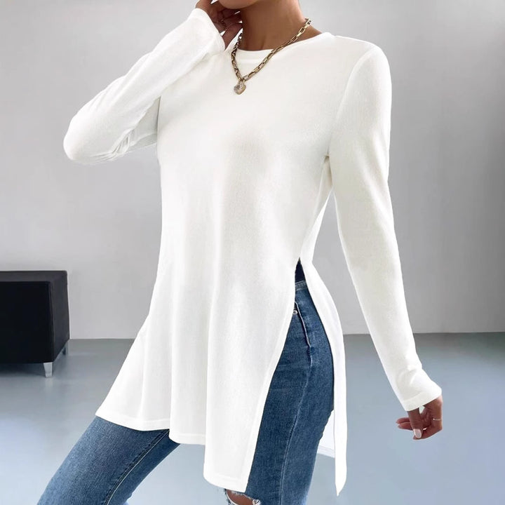 Damer Oversized långärmad tröja med sidofickor och rund halsringning Mirla-Eva Jonsson