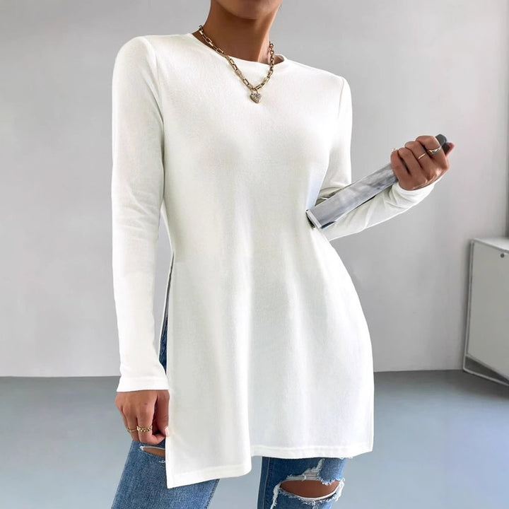 Damer Oversized långärmad tröja med sidofickor och rund halsringning Mirla-Eva Jonsson