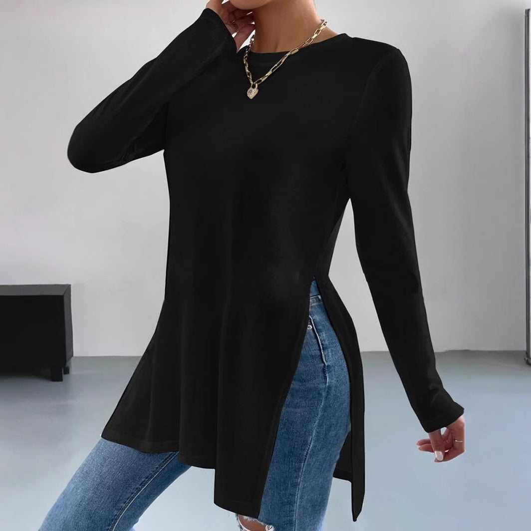 Damer Oversized långärmad tröja med sidofickor och rund halsringning Mirla-Eva Jonsson