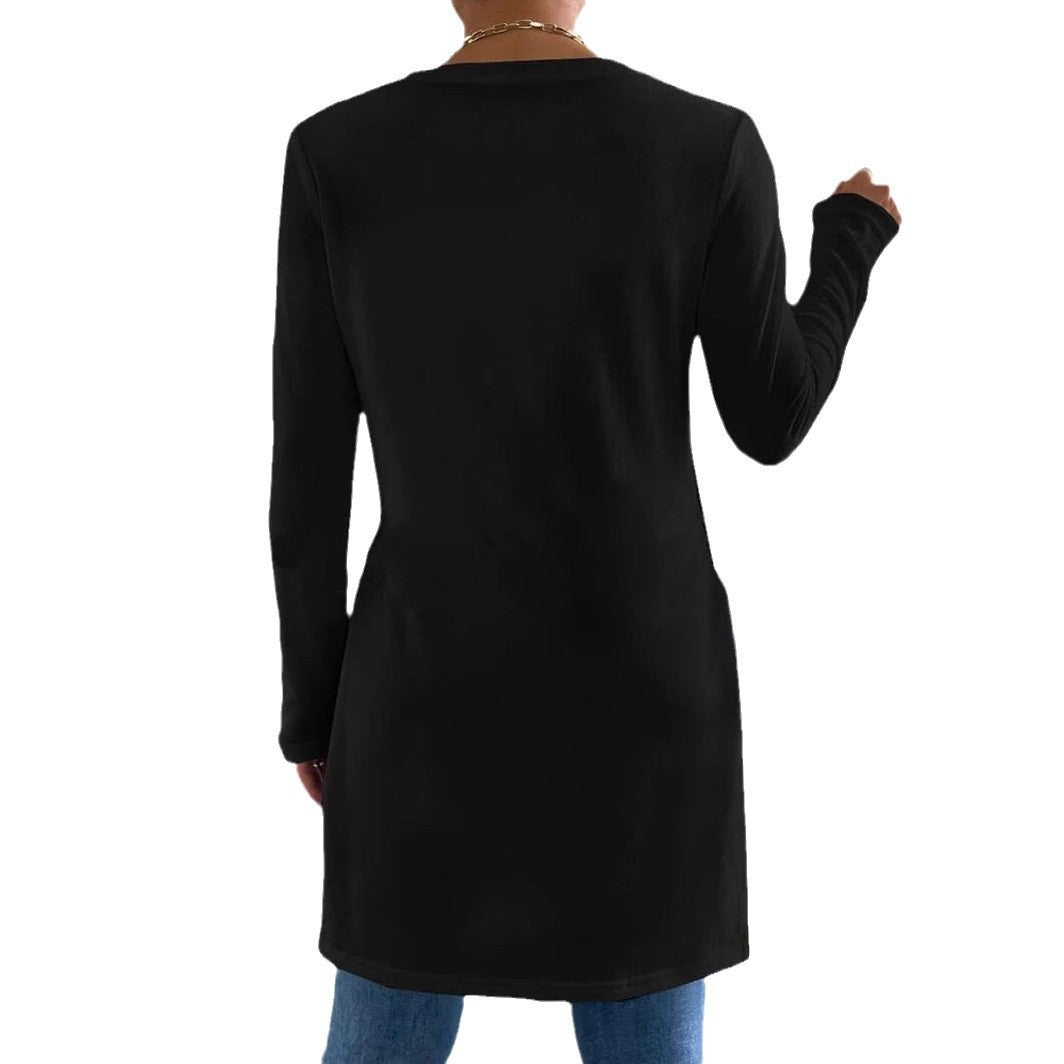 Damer Oversized långärmad tröja med sidofickor och rund halsringning Mirla-Eva Jonsson