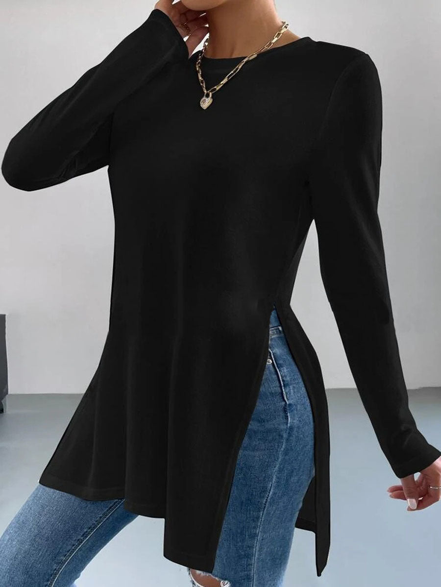 Damer Oversized långärmad tröja med sidofickor och rund halsringning Mirla-Eva Jonsson