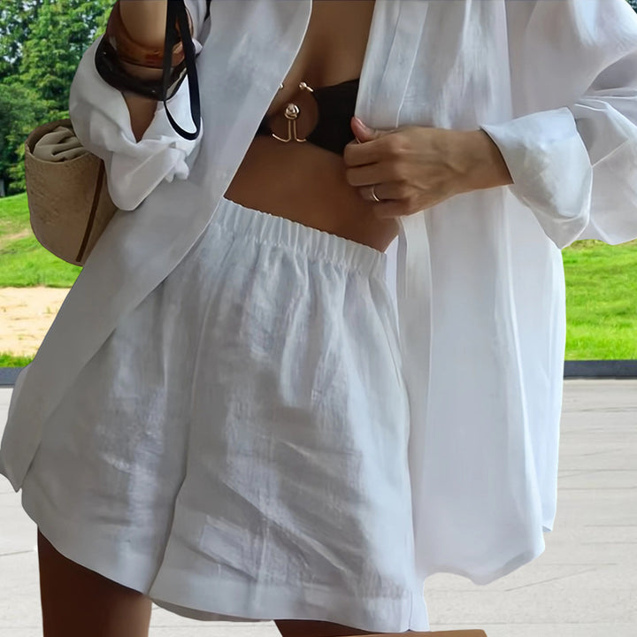 Damer Oversized skjortklänning med långa ärmar och asymmetrisk skärning Mirla-Eva Jonsson