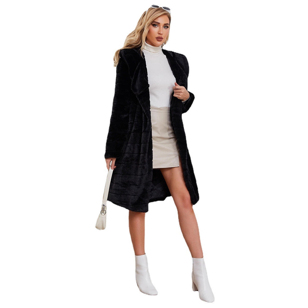Damer Pälsjacka i konstpäls med oversized huva och elegant krage Mirla-Eva Jonsson