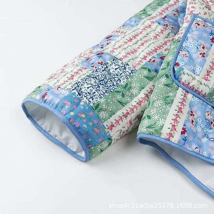 Damer Patchwork Vadderad Jacka med Blommönster och Praktiska Sidofickor Mirla-Eva Jonsson