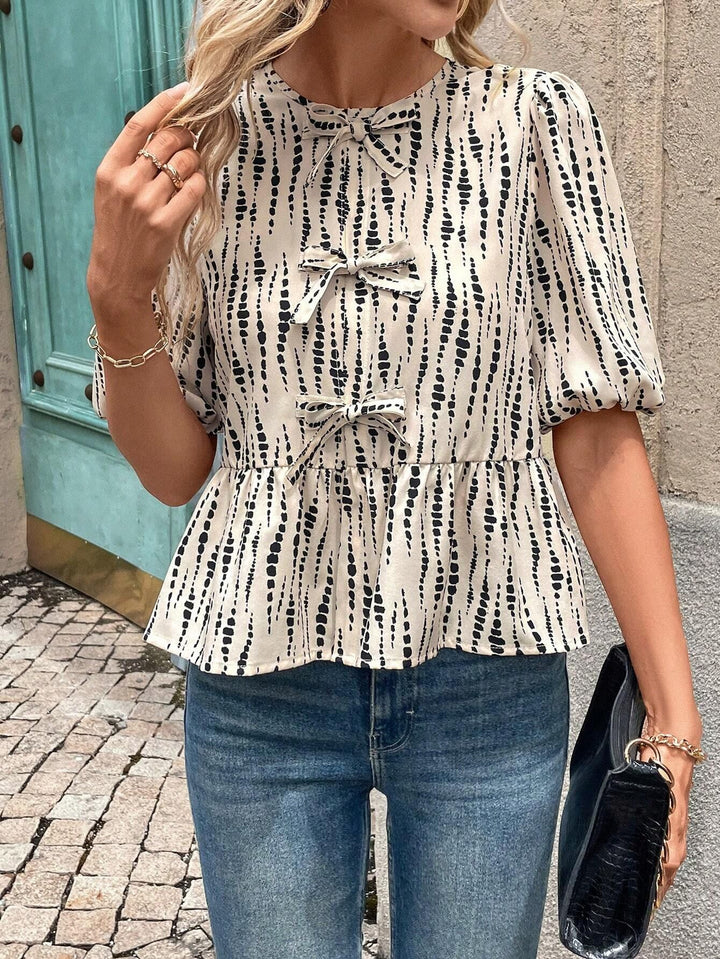 Damer Peplum-blus med dekorativa rosetter Mirla-Eva Jonsson