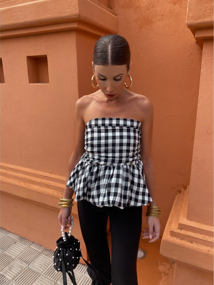 Damer Peplum-top med axelbar design Mirla-Eva Jonsson