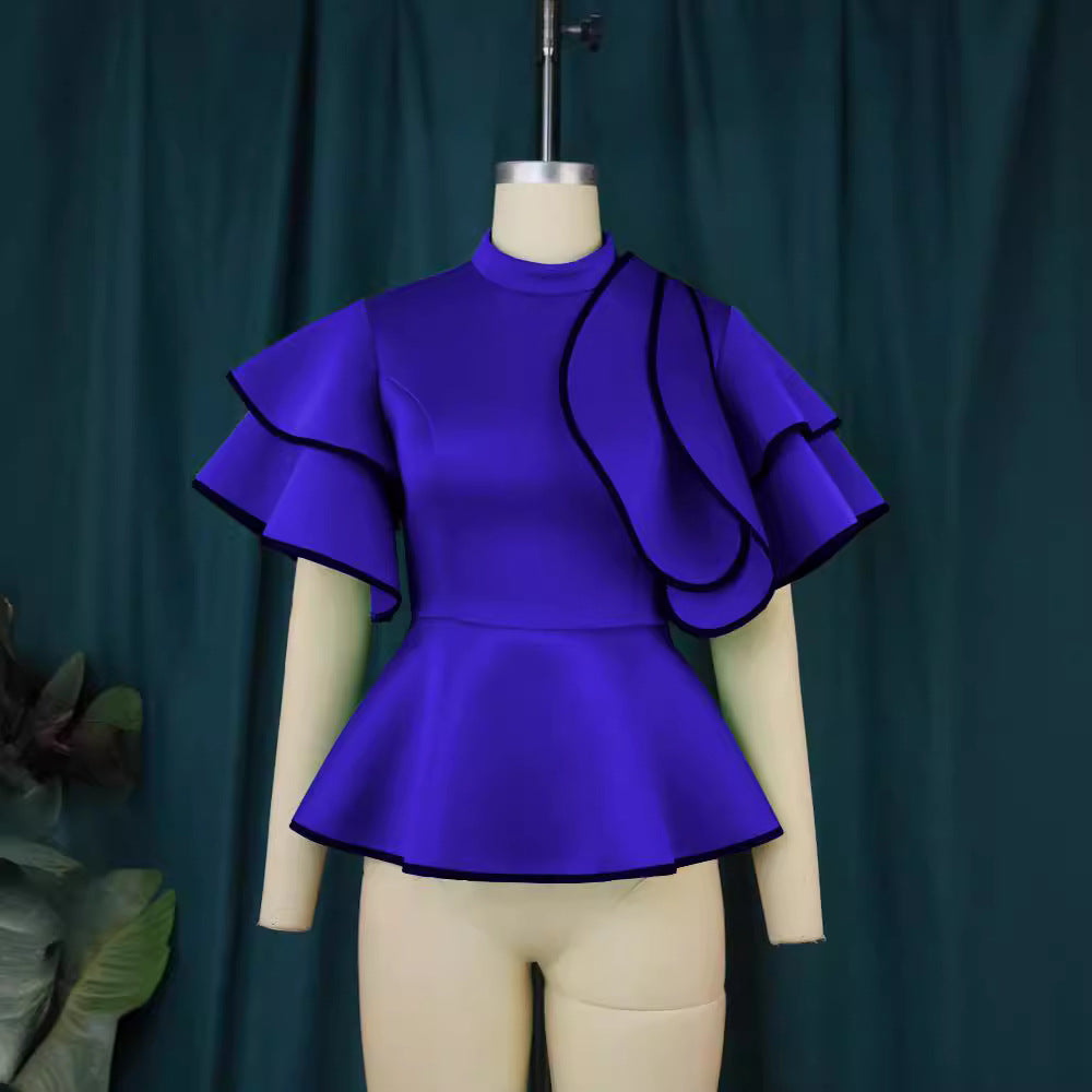 Damer Peplum-top med utstickande volanger och asymmetrisk skärning Mirla-Eva Jonsson