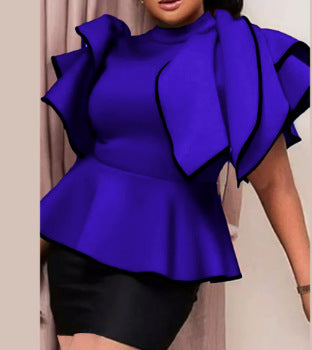 Damer Peplum-top med utstickande volanger och asymmetrisk skärning Mirla-Eva Jonsson