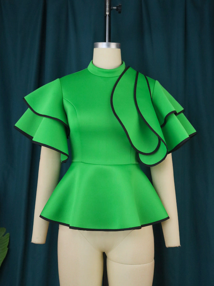 Damer Peplum-top med utstickande volanger och asymmetrisk skärning Mirla-Eva Jonsson