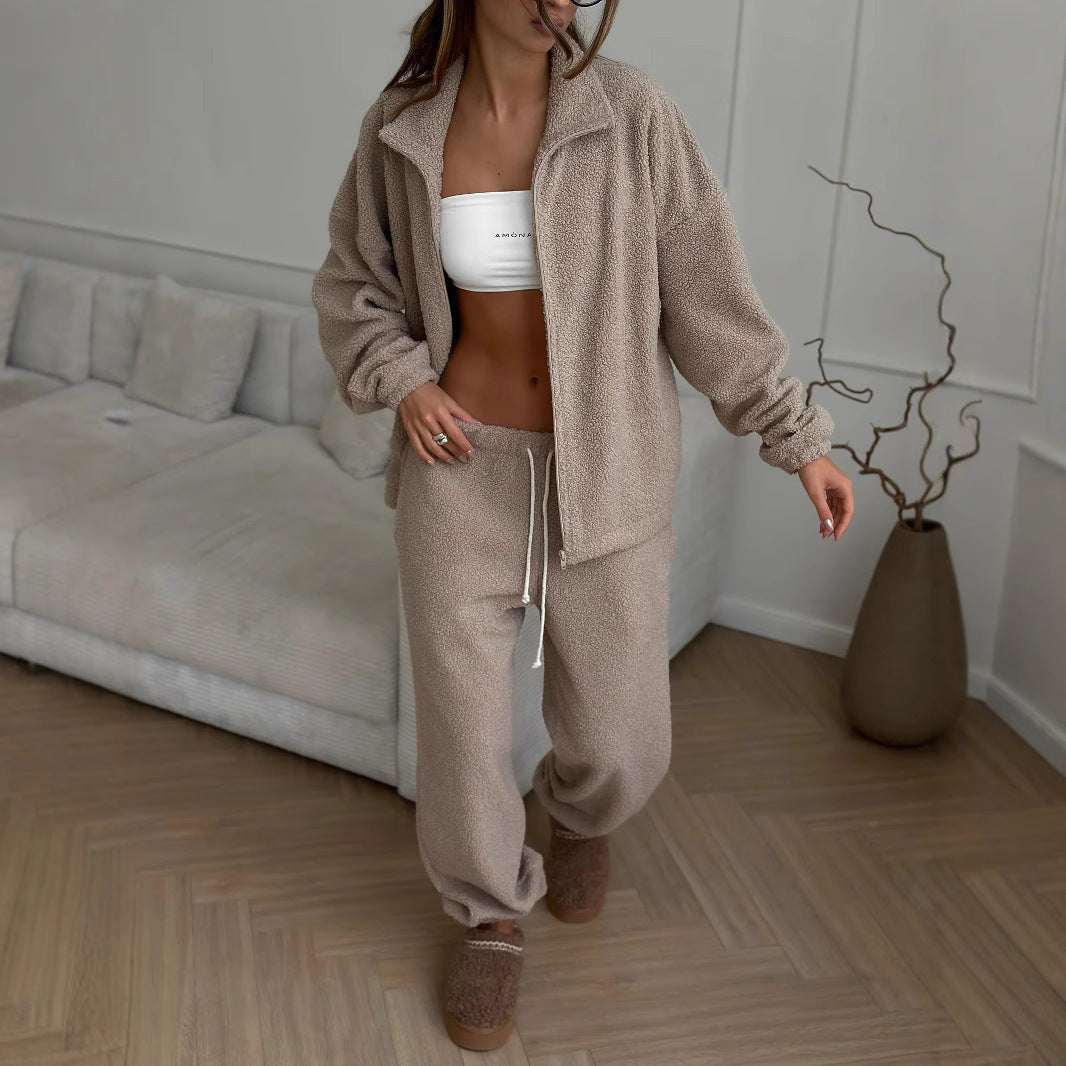Damer Robust Fleece-Joggingdräkt med hög krage och praktiska fickor Mirla-Eva Jonsson