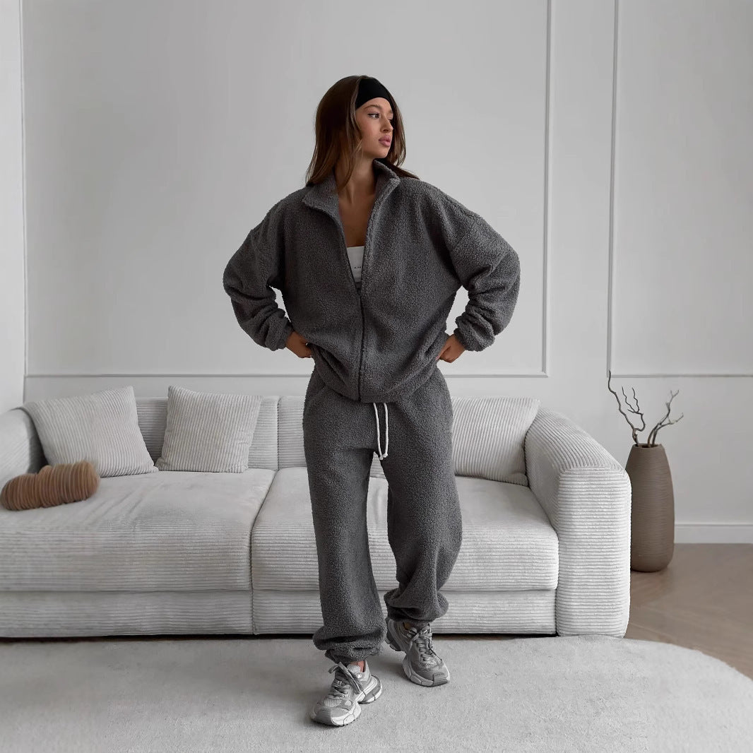 Damer Robust Fleece-Joggingdräkt med hög krage och praktiska fickor Mirla-Eva Jonsson