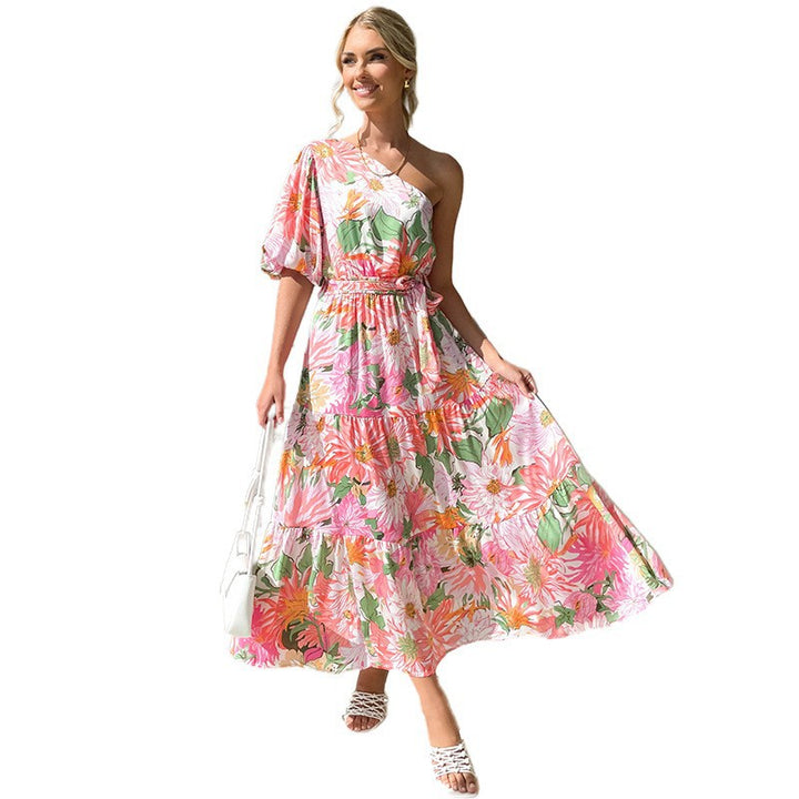Damer Sommar Maxiklänning med asymmetrisk skärning och blommönster Mirla-Eva Jonsson