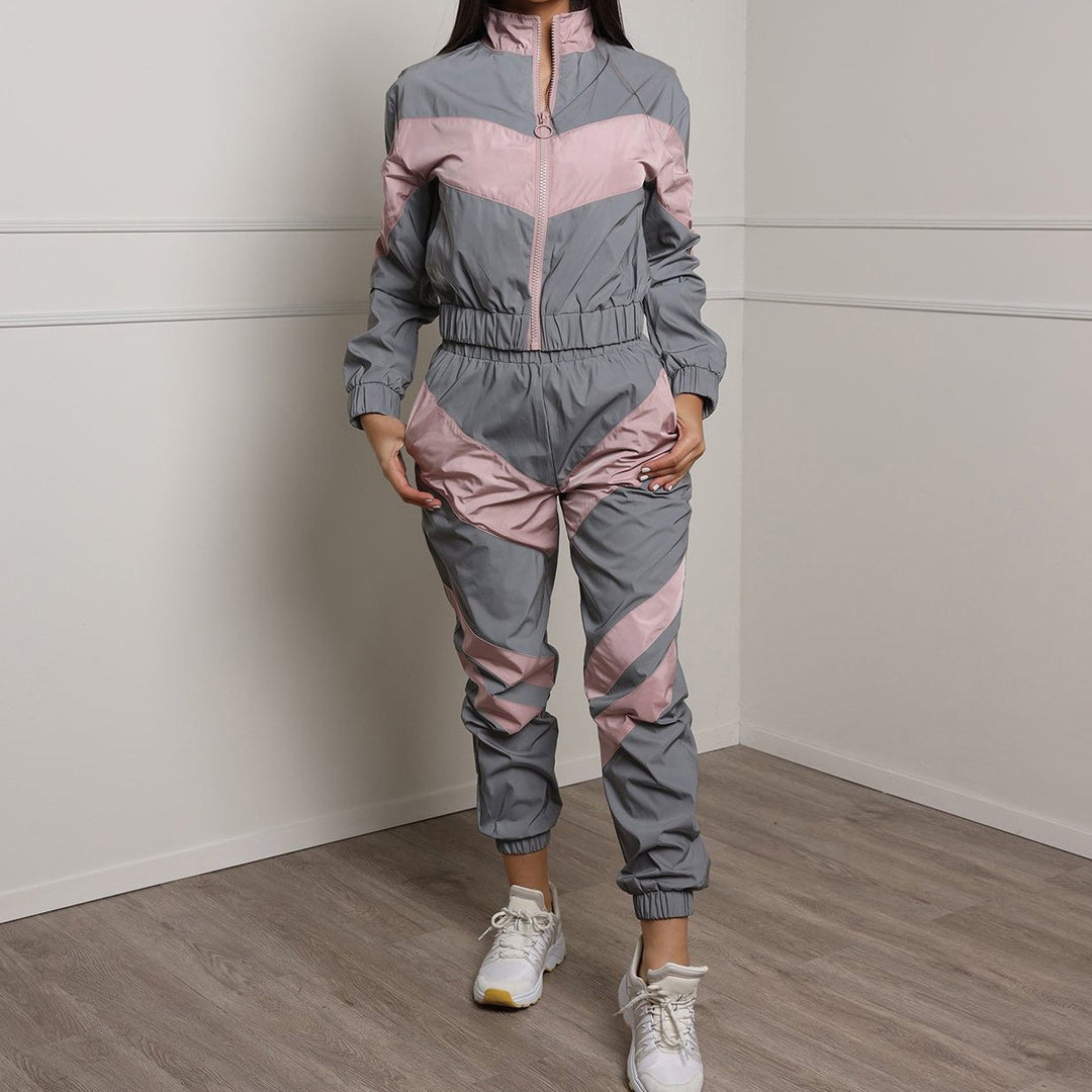 Damer Sportig Joggingdräkt med kontrasterande färgaccenter och sportig skärning Mirla-Eva Jonsson