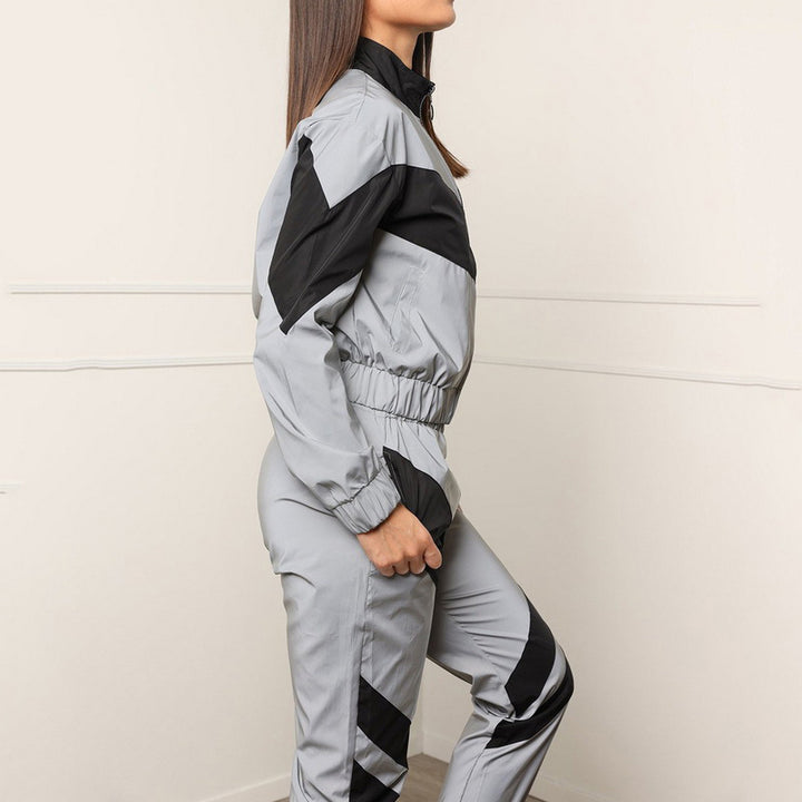 Damer Sportig Joggingdräkt med kontrasterande färgaccenter och sportig skärning Mirla-Eva Jonsson
