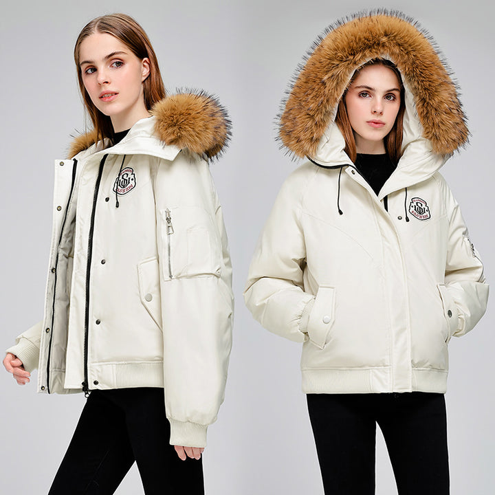 Damer Sportig puffjacka med avtagbar konstfuskpälskrage och praktiska fickor Mirla-Eva Jonsson