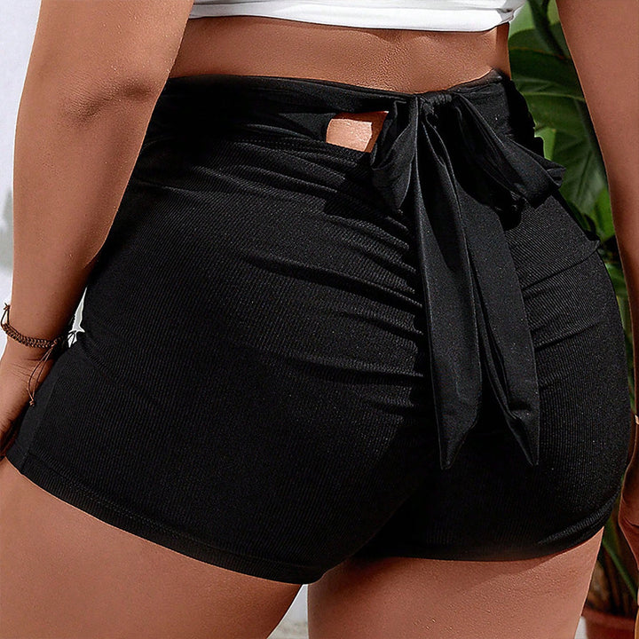 Damer Sportiga Badshorts med elastisk midja och praktiska fickor Mirla-Eva Jonsson