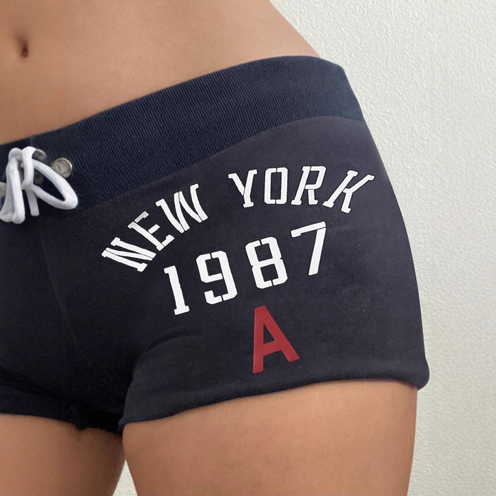 Damer Sportiga badshorts med hög midja och justerbar dragsko Mirla-Eva Jonsson