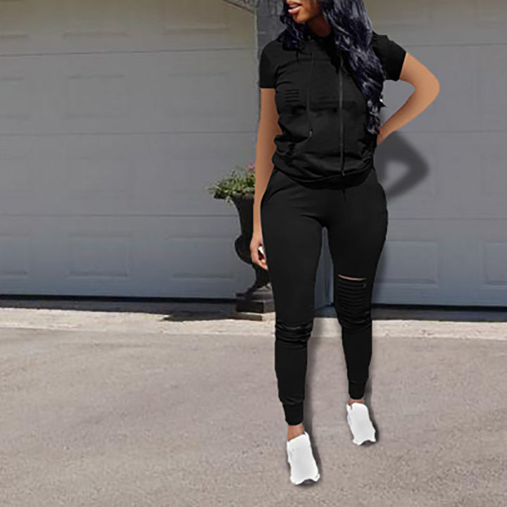 Damer Sportigt Joggingdräkts-set med croppad topp och hög midja byxor Mirla-Eva Jonsson