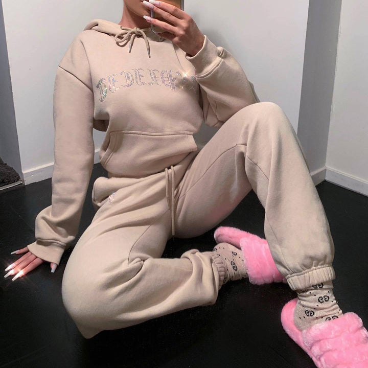 Damer Sportigt Lounge-set med huva och glittrande text Mirla-Eva Jonsson