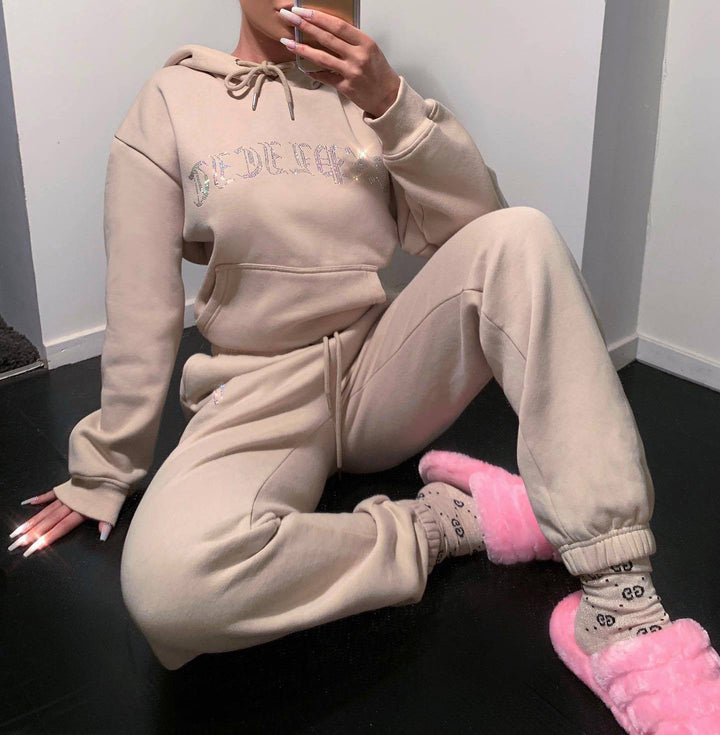 Damer Sportigt Lounge-set med huva och glittrande text Mirla-Eva Jonsson