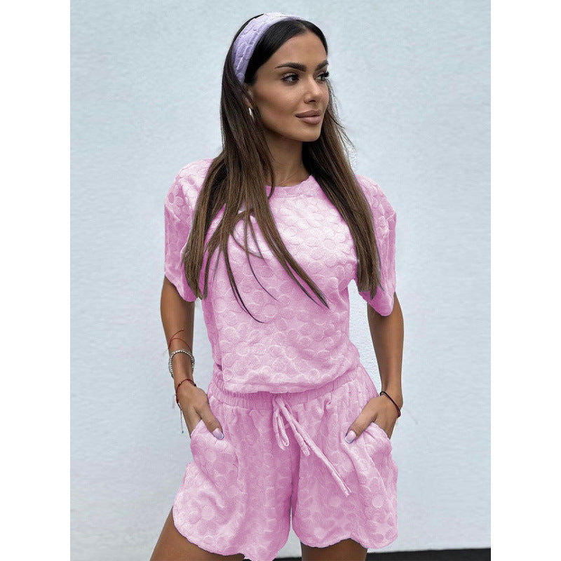 Damer Sportigt Tvådelat Set med Luftiga Shorts och T-shirt Mirla-Eva Jonsson