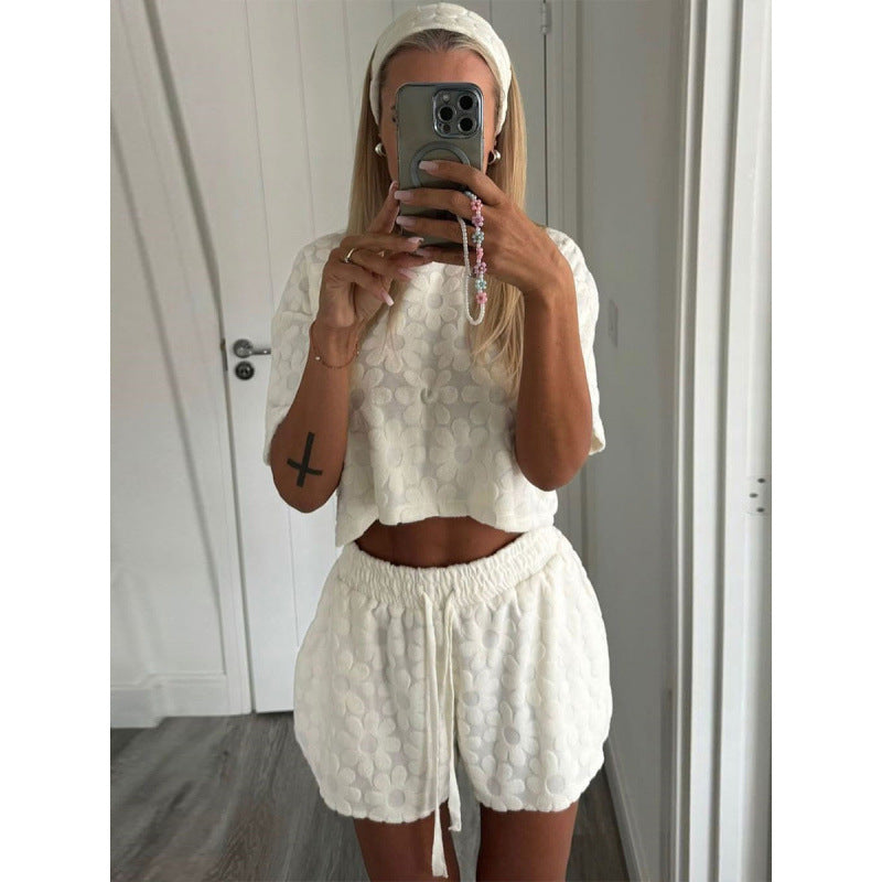 Damer Sportigt Tvådelat Set med Luftiga Shorts och T-shirt Mirla-Eva Jonsson