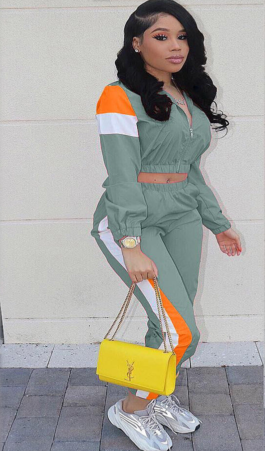 Damer Sportigt Tvådelat Set med trendig Crop-Top och slim Joggingbyxor Mirla-Eva Jonsson