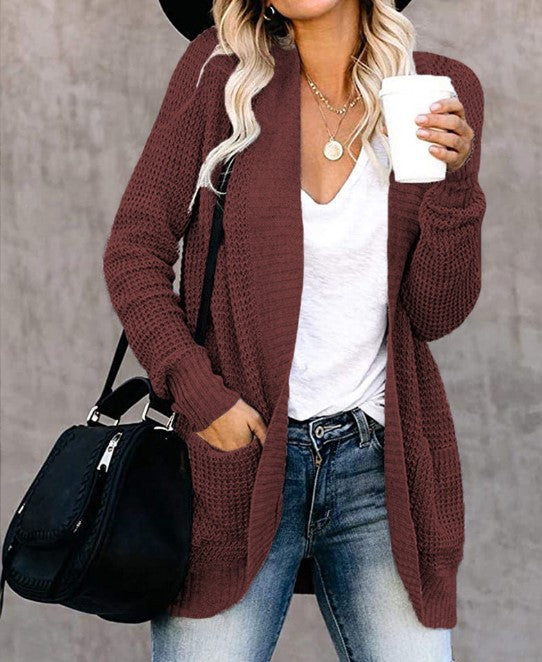 Damer Stickad Cardigan med Praktiska Fickor och Luftig Struktur Mirla-Eva Jonsson